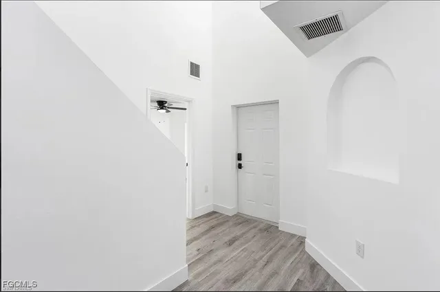 a view of a livingroom with wooden floor