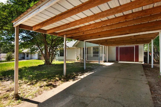 a view of a porch with garden
