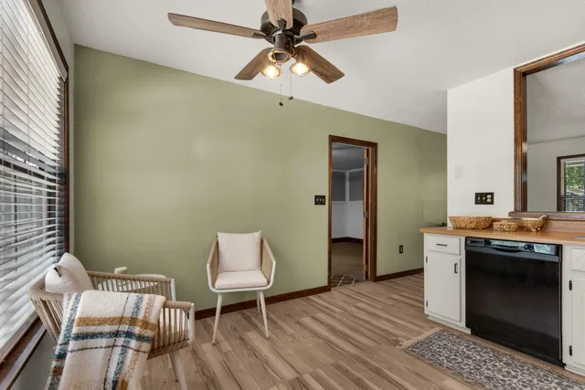 a room with furniture and a fireplace