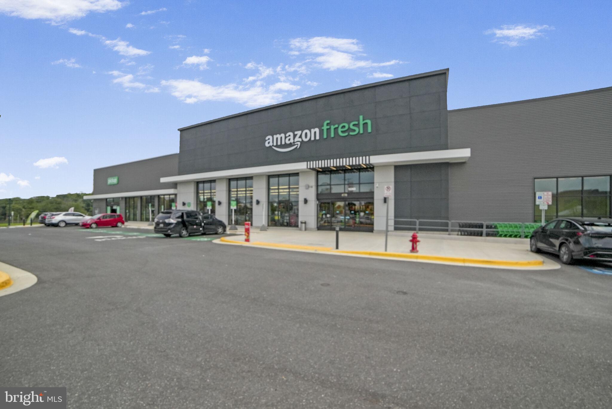3650 Castle Terrace, Unit 11112 Silver Spring, MD 20904 - Photo 22 of 26 a view of a building with car parked