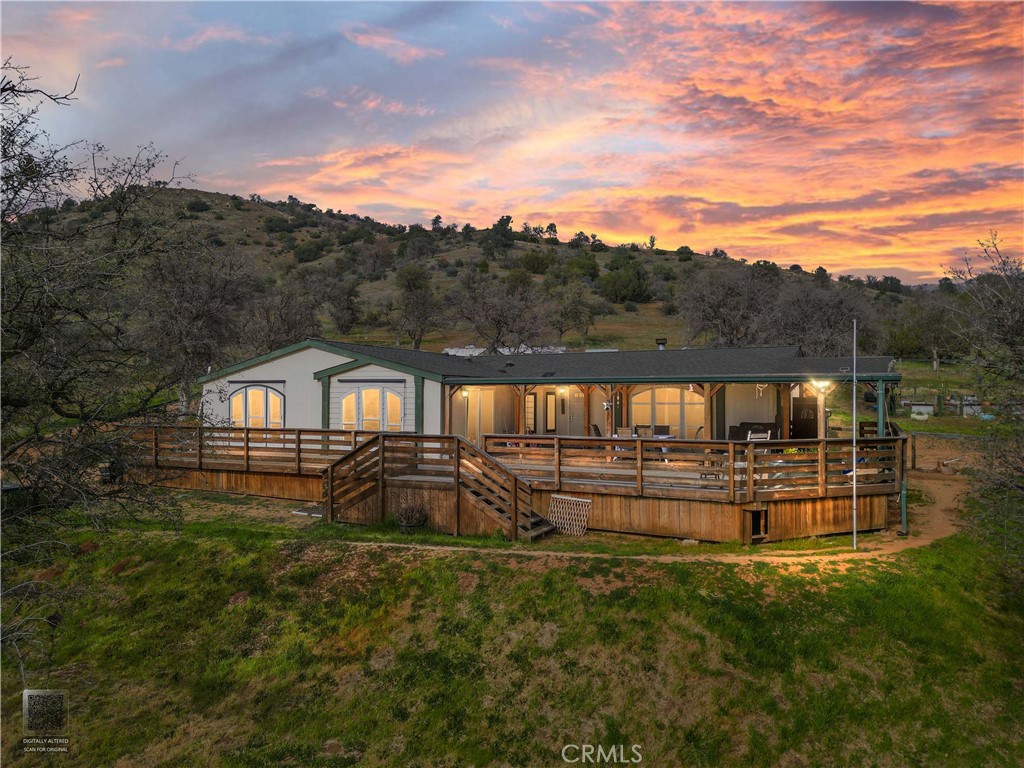 42100 Buckeye Street Caliente, CA 93518 - Photo 1 of 64 a front view of a house with a yard