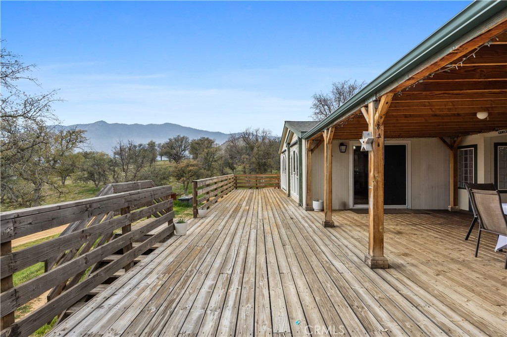 42100 Buckeye Street Caliente, CA 93518 - Photo 13 of 64 a view of balcony with wooden floor and fence