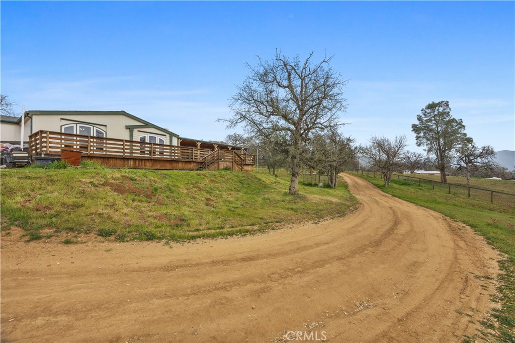 42100 Buckeye Street Caliente, CA 93518 - Photo 18 of 64 a view of a house with a yard