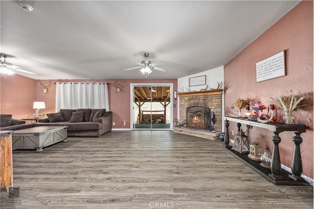 42100 Buckeye Street Caliente, CA 93518 - Photo 20 of 64 a living room with furniture flat screen tv and fireplace