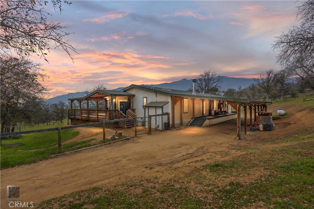 42100 Buckeye Street Caliente, CA 93518 - Photo 2 of 64 a view of a house with backyard porch and sitting area