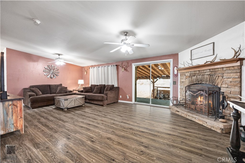 42100 Buckeye Street Caliente, CA 93518 - Photo 21 of 64 a living room with furniture and a fireplace