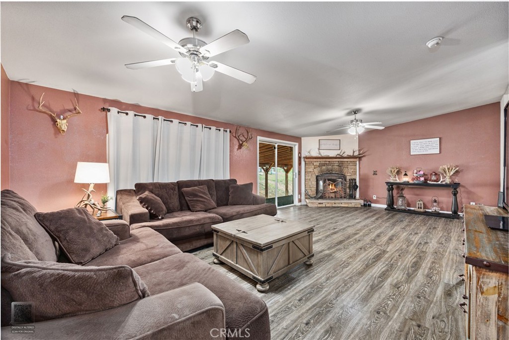 42100 Buckeye Street Caliente, CA 93518 - Photo 25 of 64 a living room with furniture and a chandelier