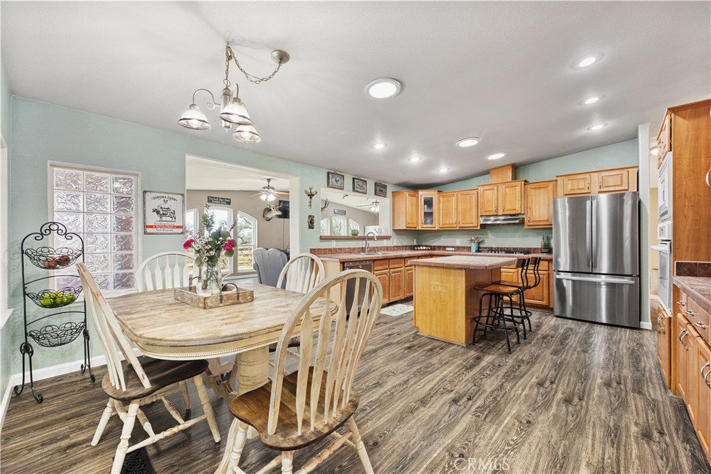 42100 Buckeye Street Caliente, CA 93518 - Photo 27 of 64 a view of a dining room with furniture and wooden floor