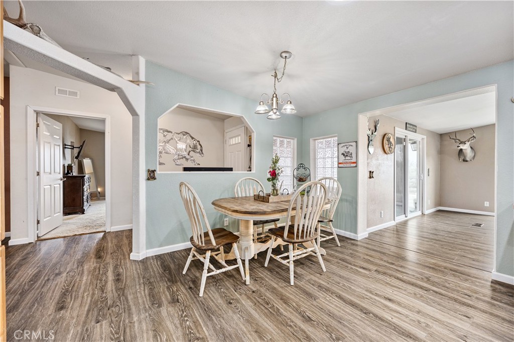 42100 Buckeye Street Caliente, CA 93518 - Photo 28 of 64 a view of a dining room with furniture and wooden floor