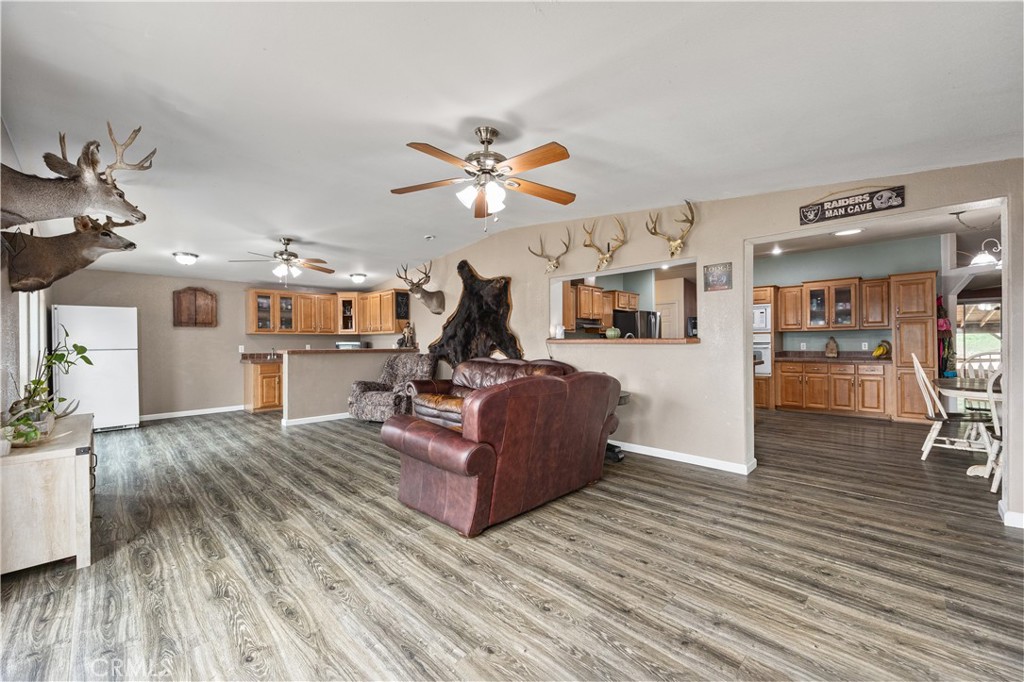 42100 Buckeye Street Caliente, CA 93518 - Photo 34 of 64 a living room with furniture and wooden floor