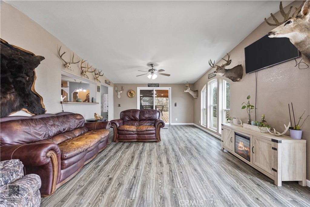 42100 Buckeye Street Caliente, CA 93518 - Photo 36 of 64 a living room with furniture and a wooden floor