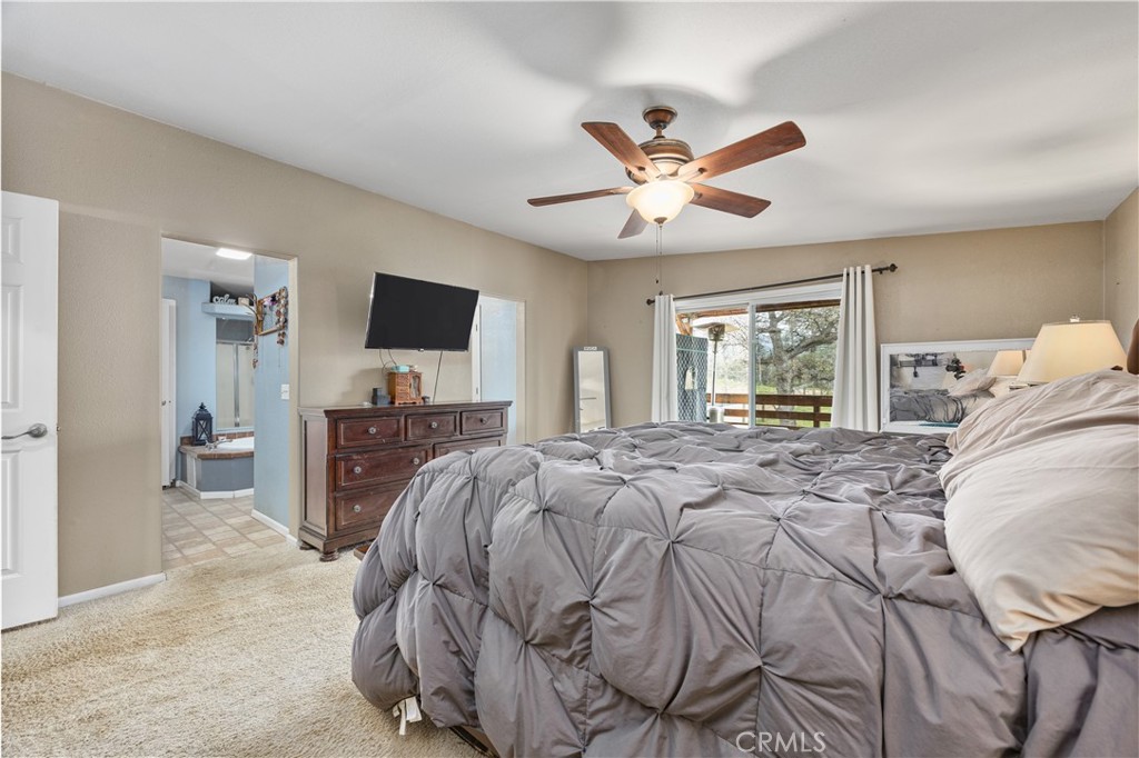 42100 Buckeye Street Caliente, CA 93518 - Photo 41 of 64 a bedroom with a bed and a flat screen tv