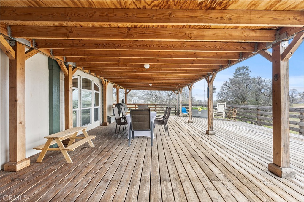42100 Buckeye Street Caliente, CA 93518 - Photo 52 of 64 a view of a patio with table and chairs with wooden floor