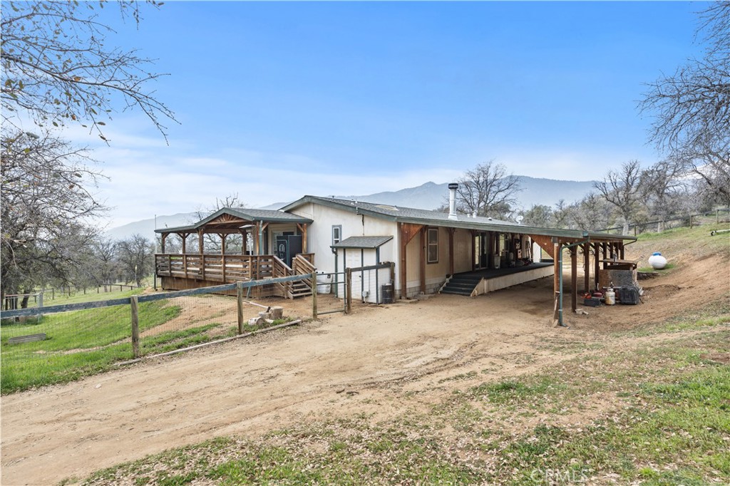 42100 Buckeye Street Caliente, CA 93518 - Photo 63 of 64 a view of a house with backyard and sitting area