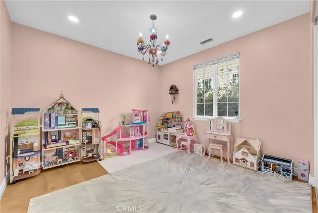 a spacious bathroom with a glass shower door and a glass door