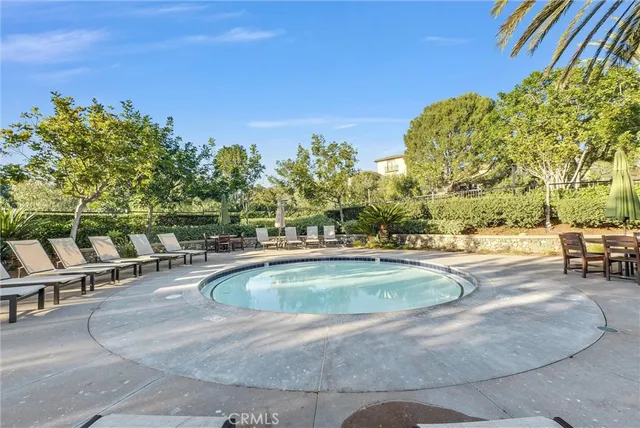 an aerial view of residential building and trees around