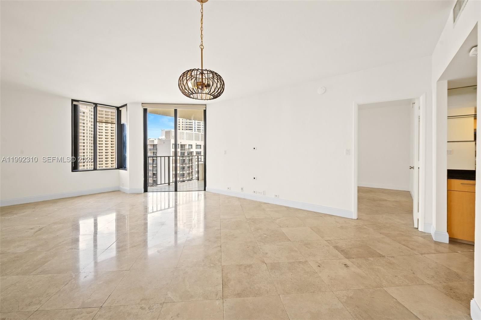 520 Brickell Key Drive, Unit A1712 Miami, FL 33131 - Photo 2 of 34 a view of an empty room with a window