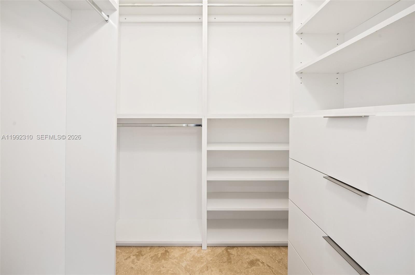 520 Brickell Key Drive, Unit A1712 Miami, FL 33131 - Photo 22 of 34 a view of a room with shelf on the wall