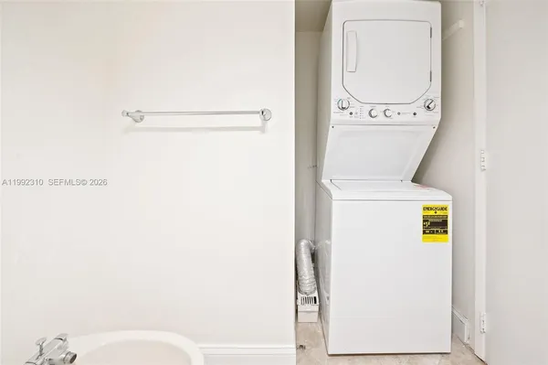 a bathroom with a sink vanity and a mirror