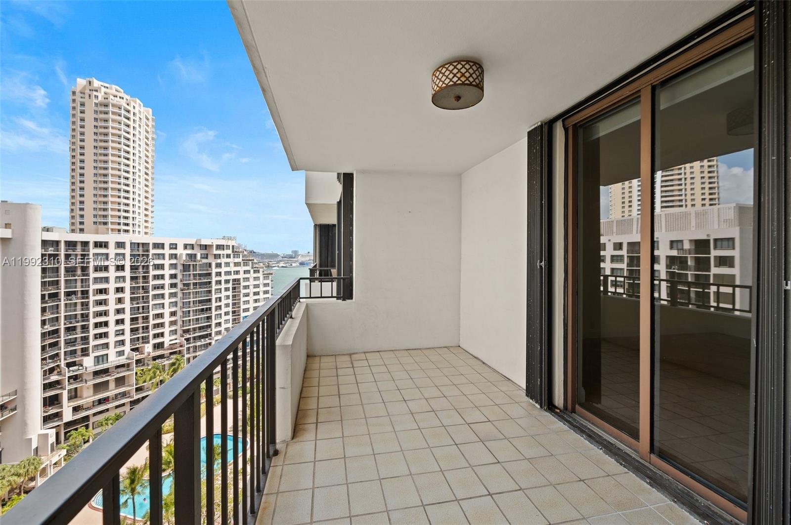 520 Brickell Key Drive, Unit A1712 Miami, FL 33131 - Photo 5 of 34 a view of balcony with wooden floor