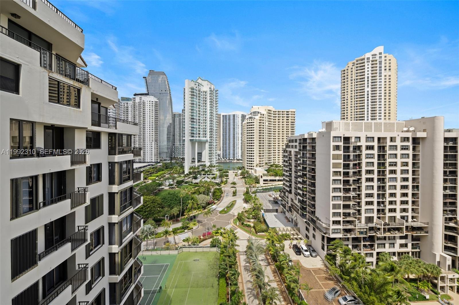 520 Brickell Key Drive, Unit A1712 Miami, FL 33131 - Photo 6 of 34 a view of buildings with lot of windows