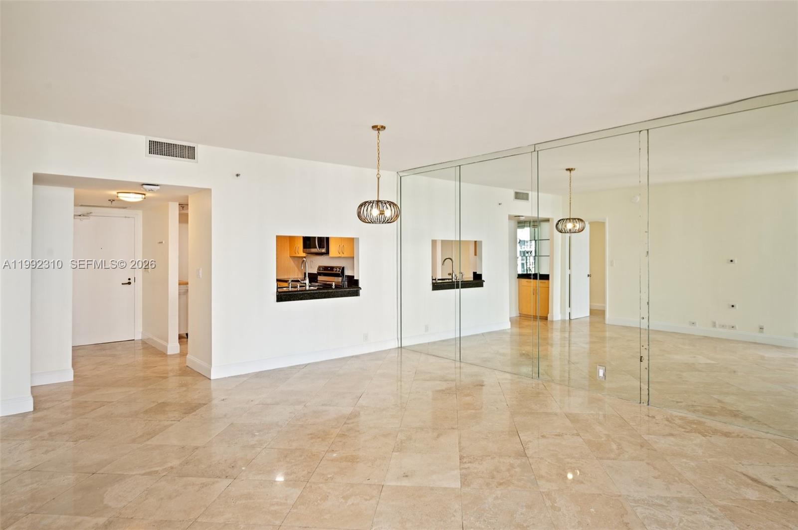 520 Brickell Key Drive, Unit A1712 Miami, FL 33131 - Photo 9 of 34 a view of a hallway