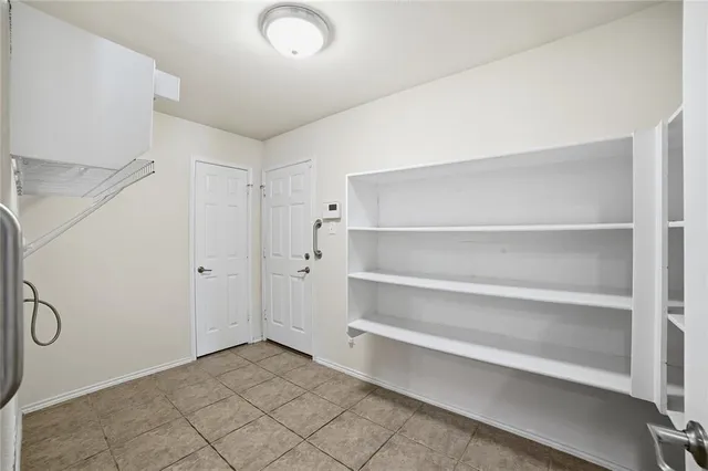 a view of a room with rack on the wall