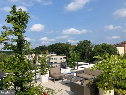 a view of a terrace with a bench