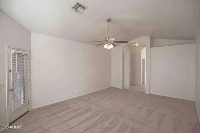 a view of an empty walk in closet