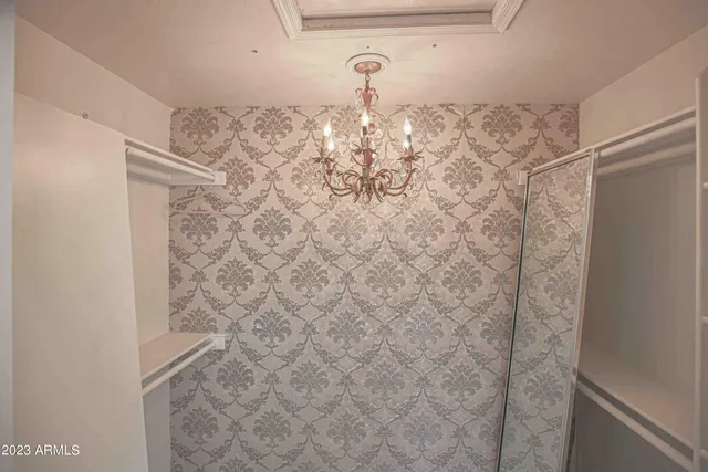 a spacious bathroom with a granite countertop sink mirror and a