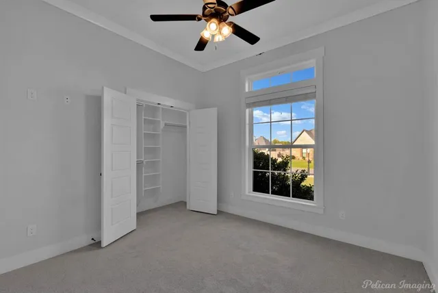 a view of an empty room and window