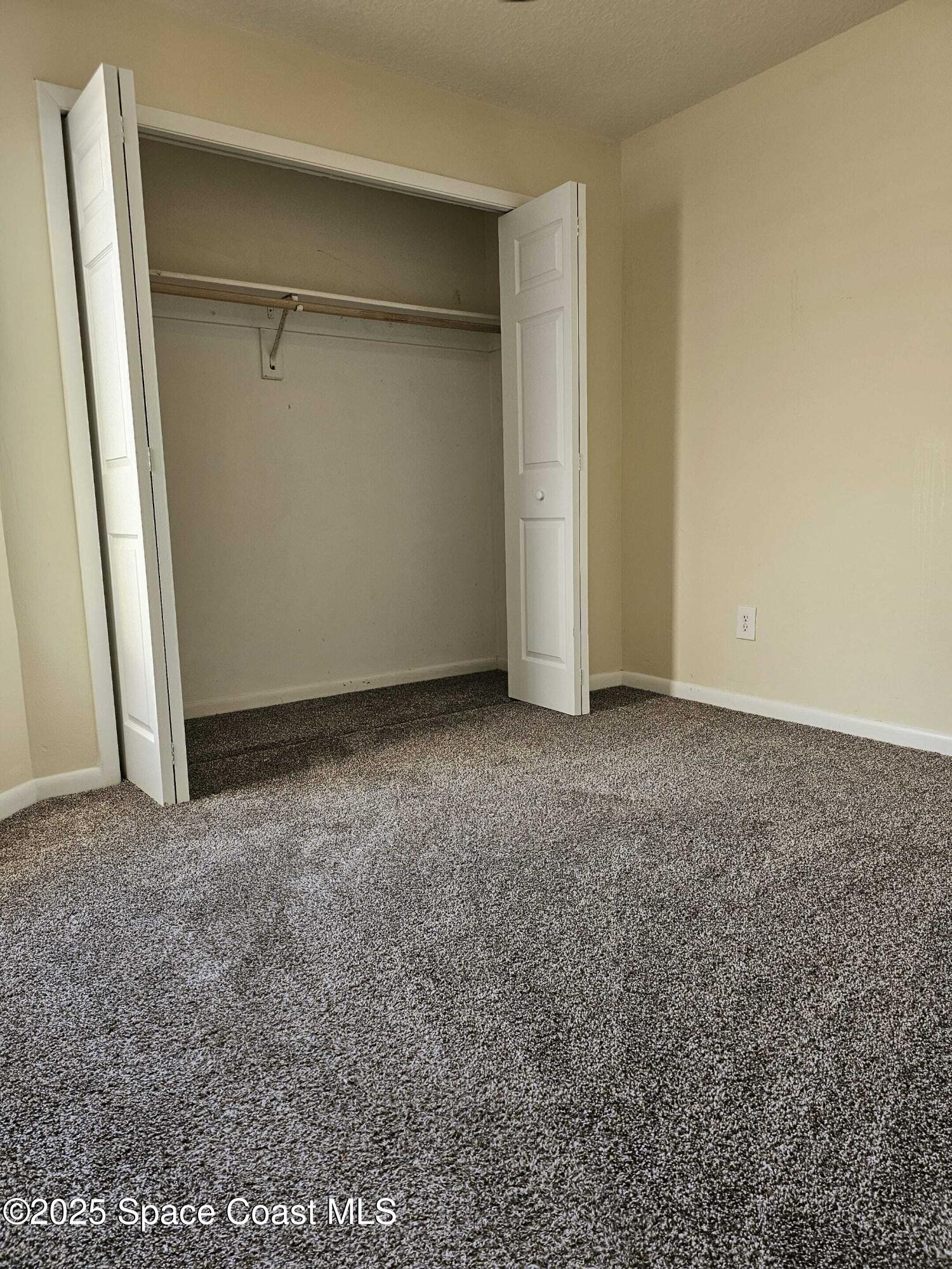 391 Cypress Point Drive Melbourne, FL 32940 - Photo 20 of 28 a view of an empty room