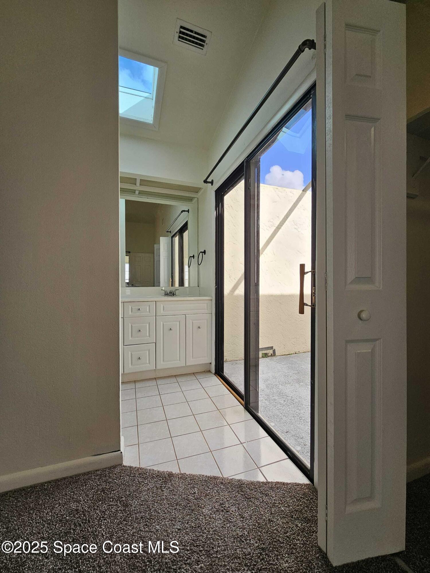 391 Cypress Point Drive Melbourne, FL 32940 - Photo 9 of 28 a view of an entryway