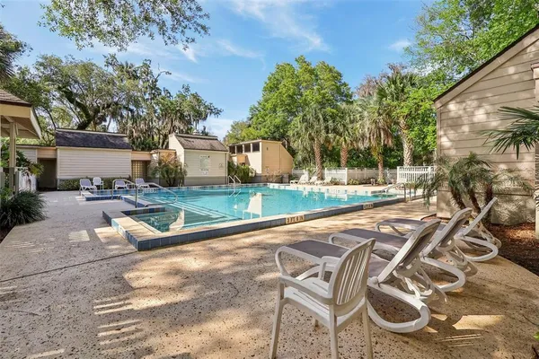 a view of swimming pool with a yard