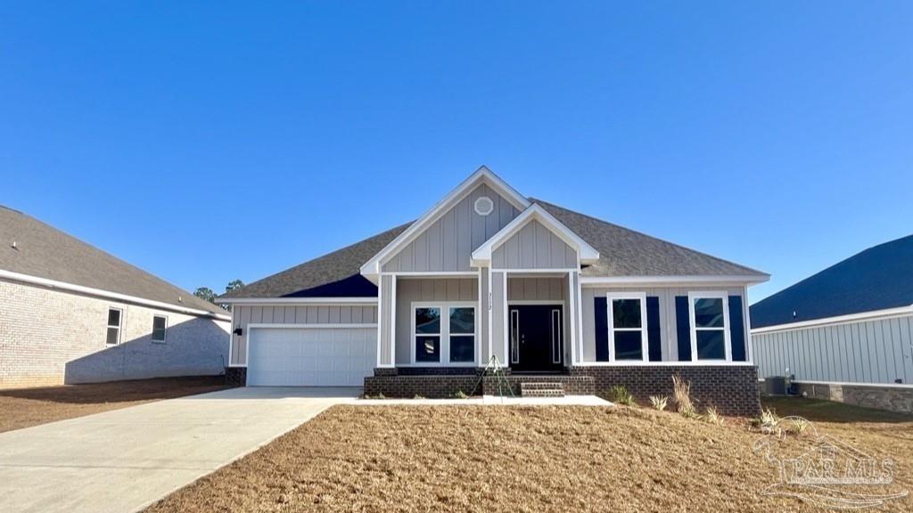 3152 Silver Maple Drive Cantonment, FL 32533 - Photo 1 of 25 a front view of a house with a yard