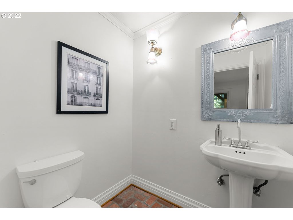 42069 Southeast Erickson Road Sandy, OR 97055 - Photo 11 of 32 a bathroom with a toilet sink and mirror
