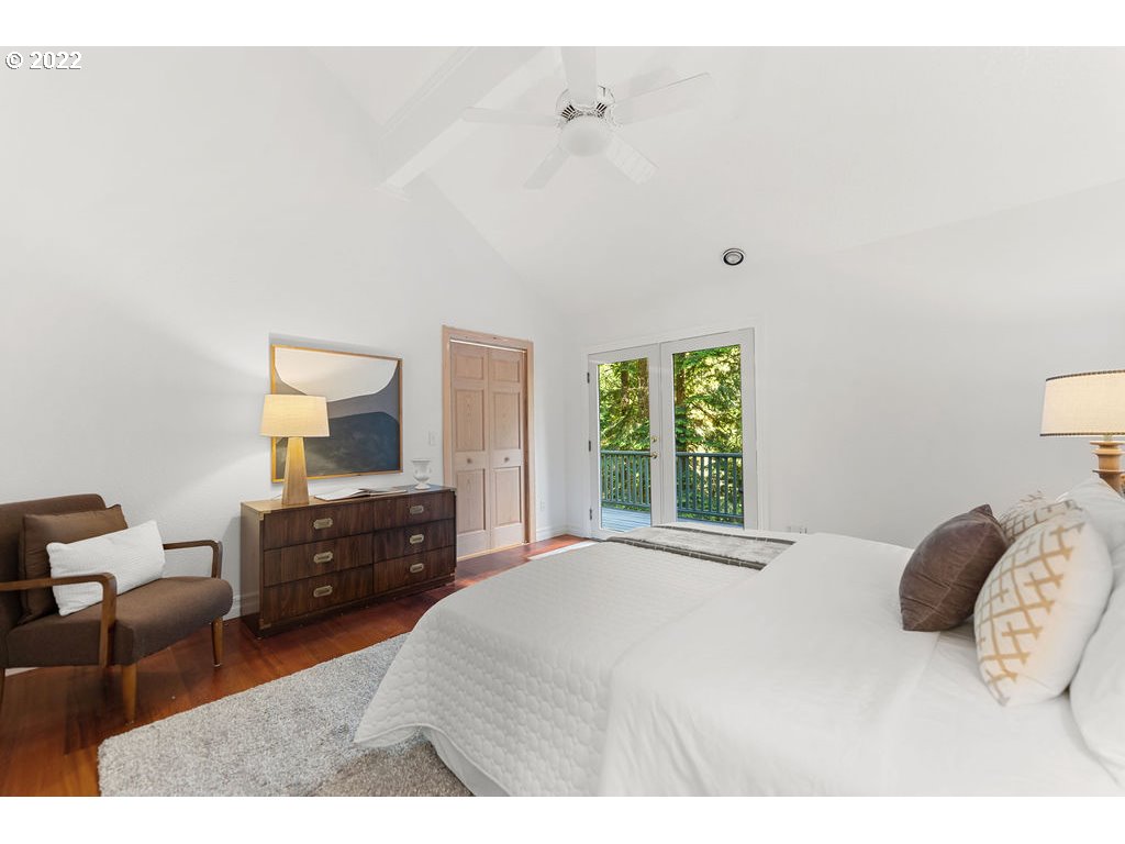 42069 Southeast Erickson Road Sandy, OR 97055 - Photo 13 of 32 a bedroom with a bed and window