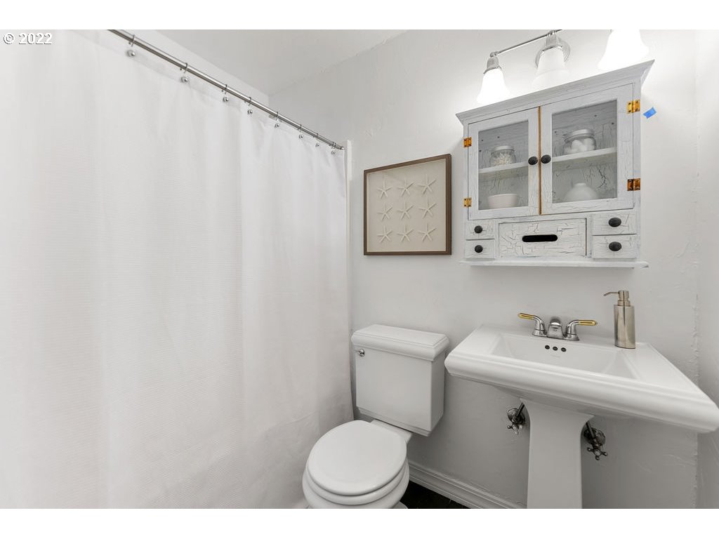 42069 Southeast Erickson Road Sandy, OR 97055 - Photo 19 of 32 a bathroom with a sink mirror vanity and toilet