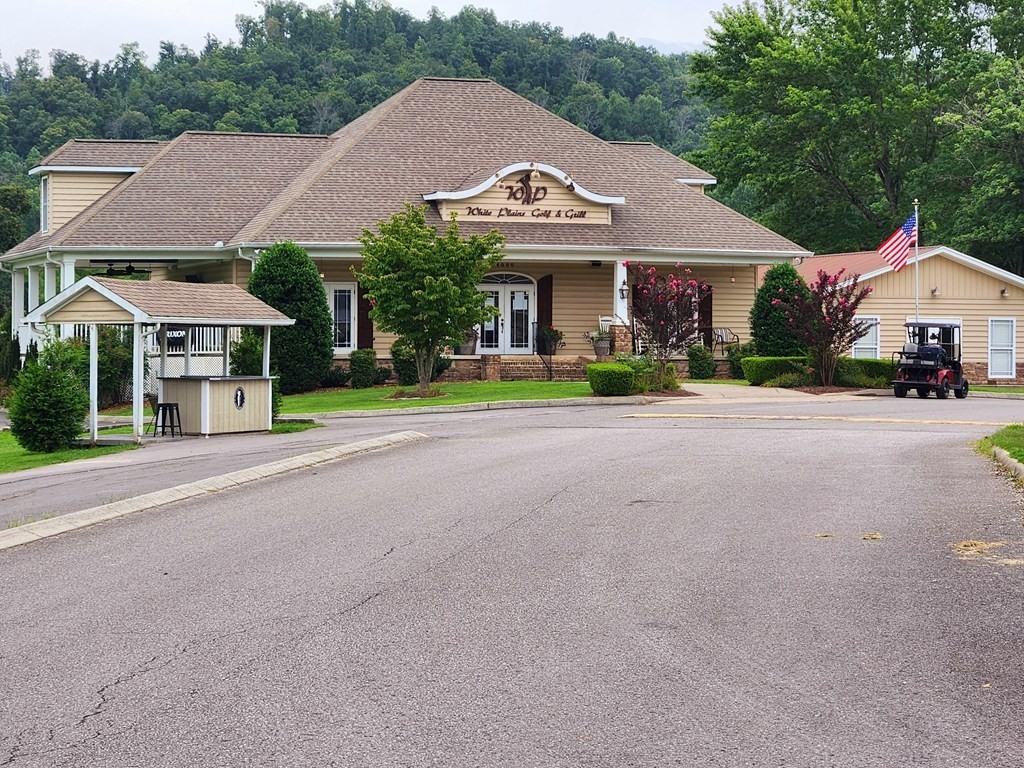 0 Plantation View Cookeville, TN 38506 - Photo 15 of 17 a front view of a house with a yard and porch