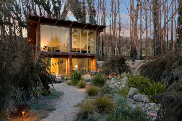 a view of a living room and dining room