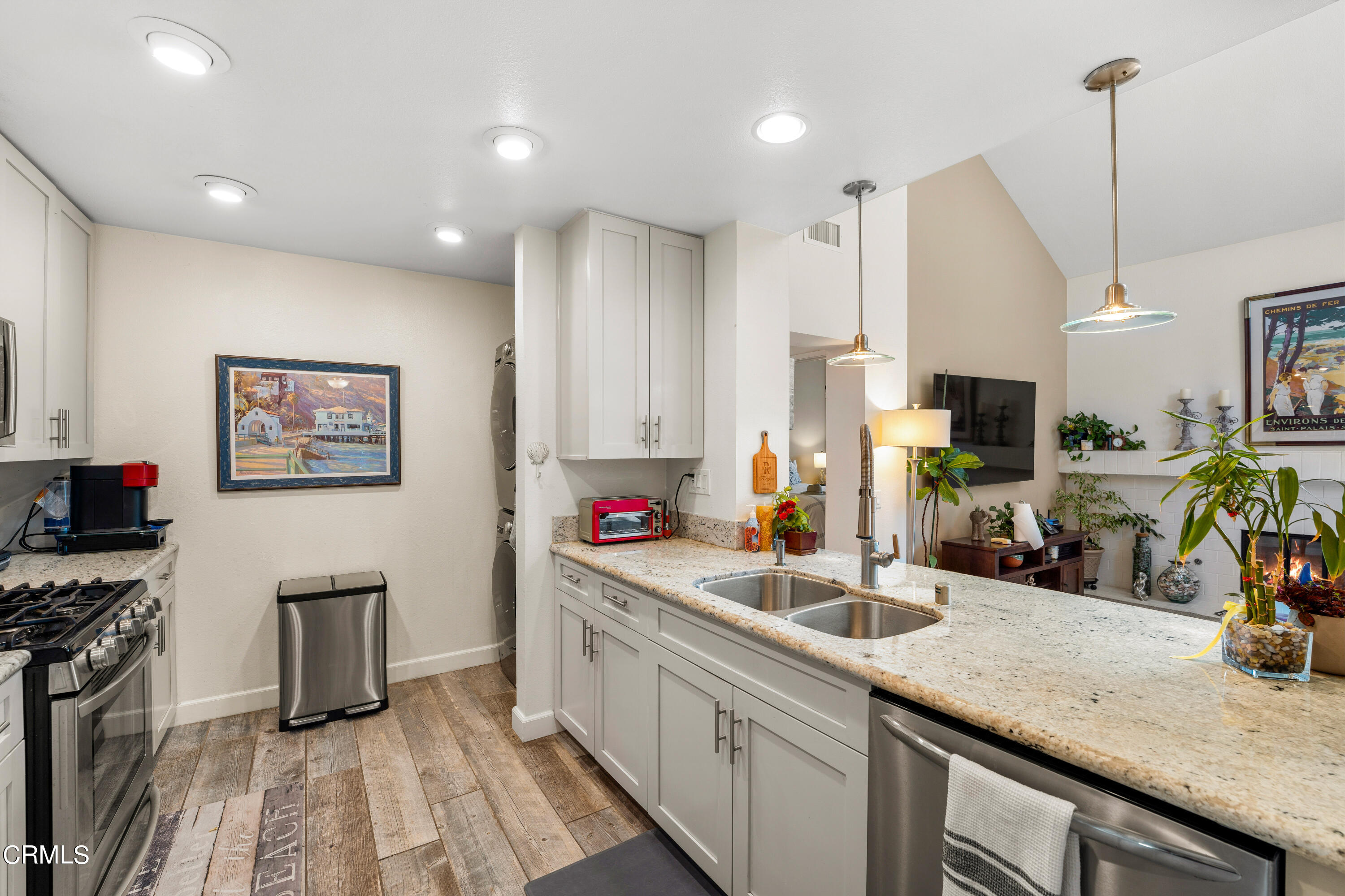 1971 Majorca Drive Oxnard, CA 93035 - Photo 19 of 44 a kitchen with sink a counter and cabinets