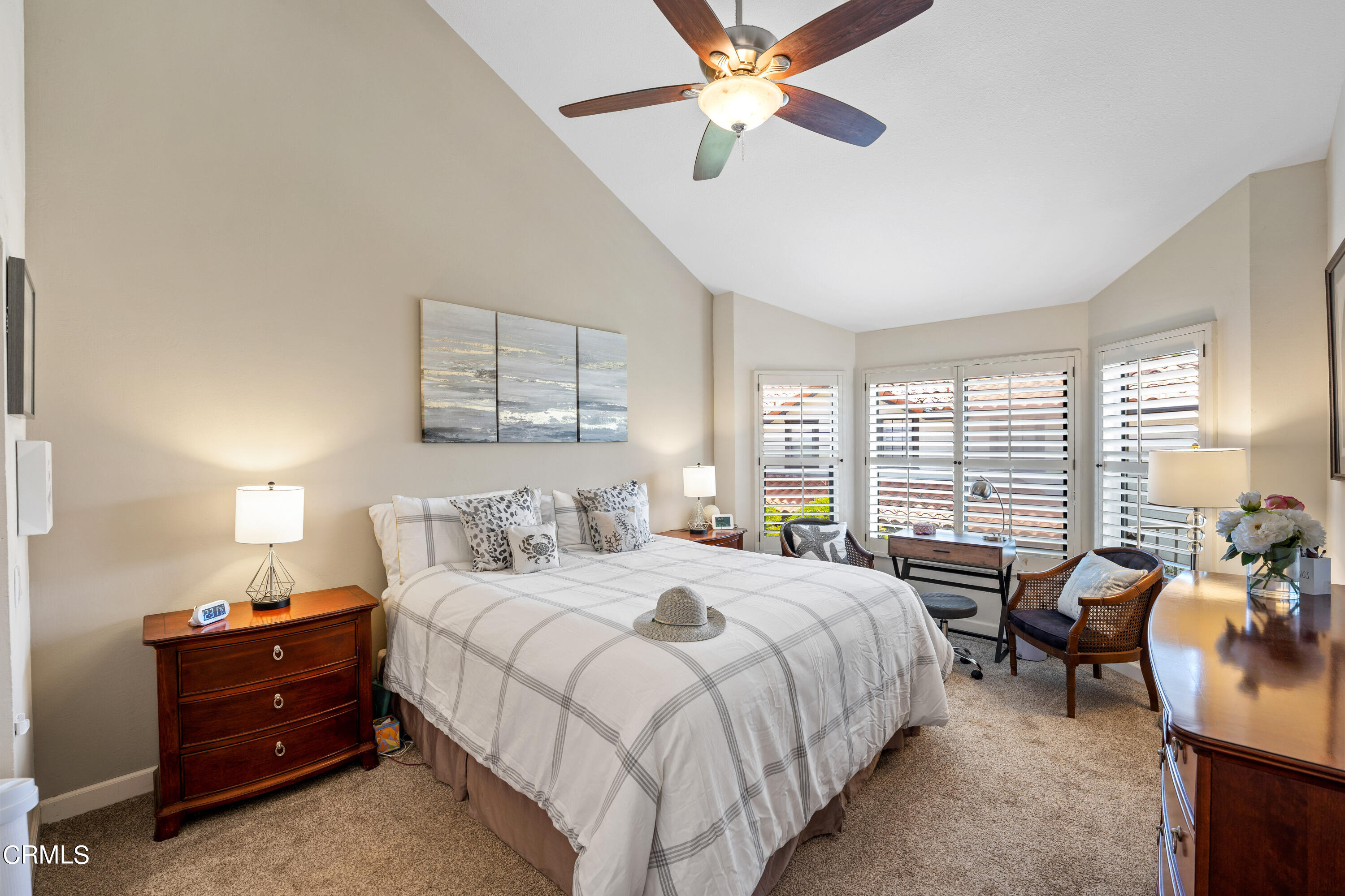 1971 Majorca Drive Oxnard, CA 93035 - Photo 20 of 44 a bedroom with a bed and a chandelier