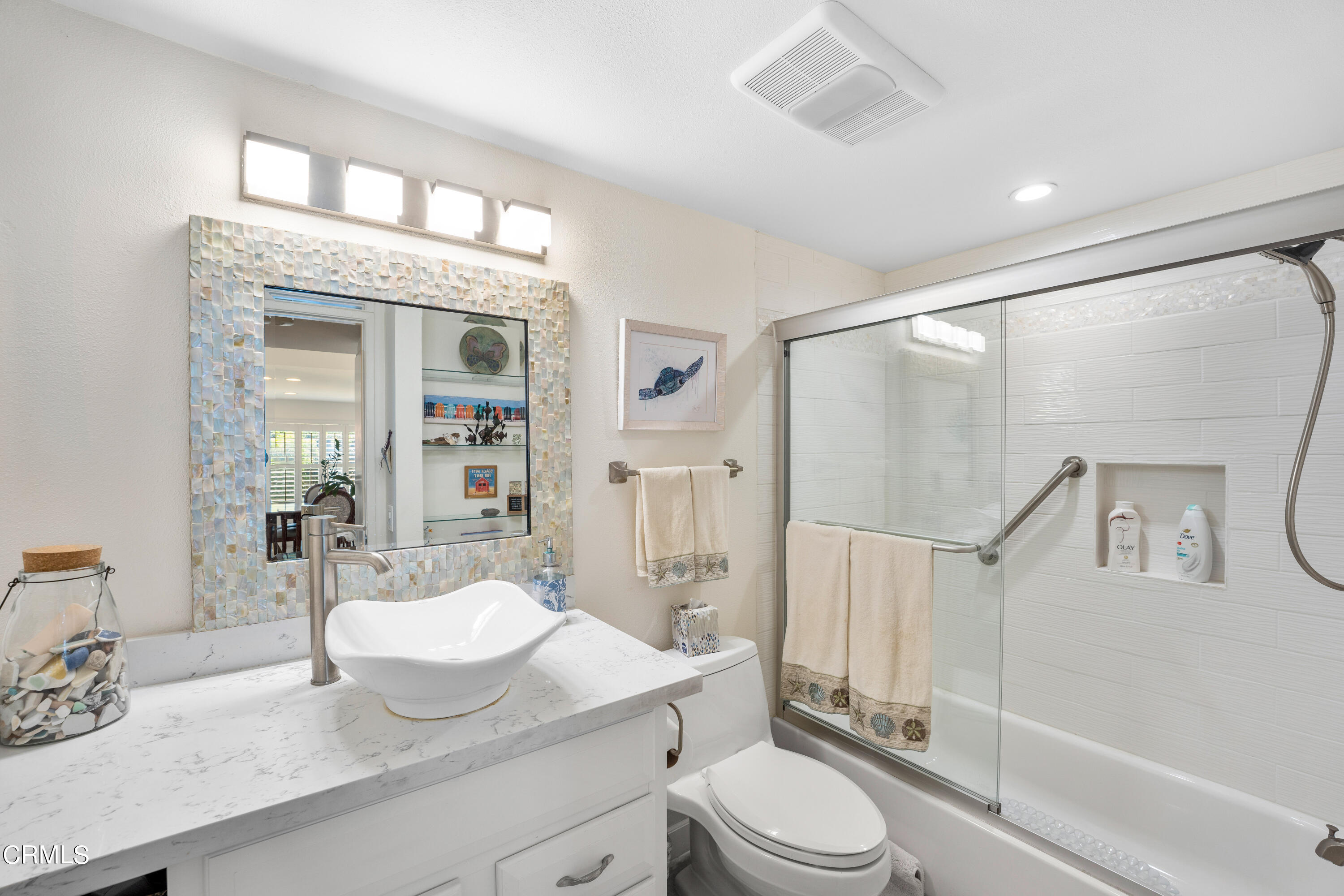 1971 Majorca Drive Oxnard, CA 93035 - Photo 25 of 44 a bathroom with a granite countertop sink toilet mirror and shower