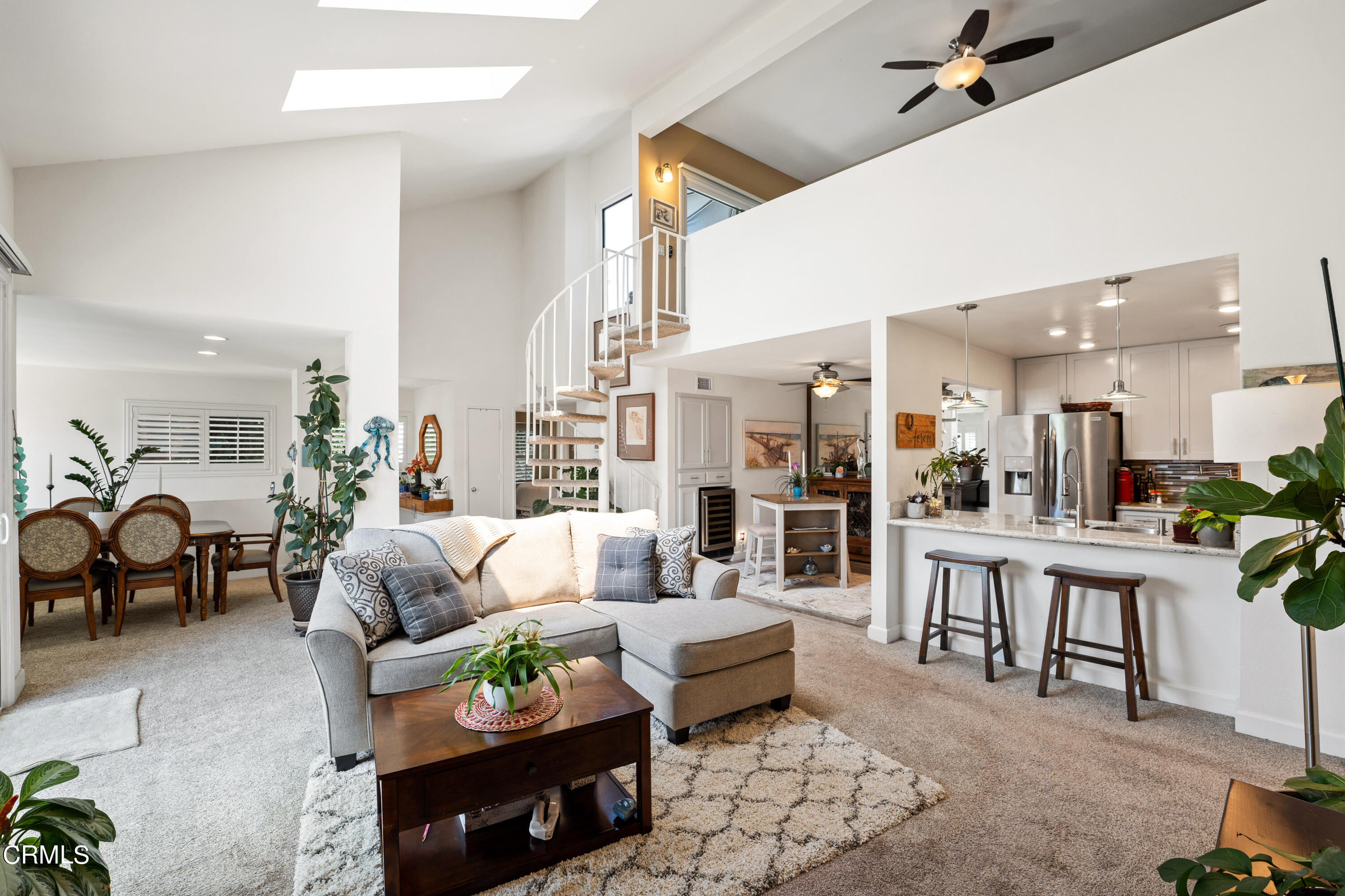 1971 Majorca Drive Oxnard, CA 93035 - Photo 7 of 44 a living room with furniture potted plant kitchen view and a large window