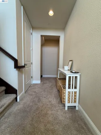a kitchen with stainless steel appliances granite countertop a refrigerator stove microwave and cabinets