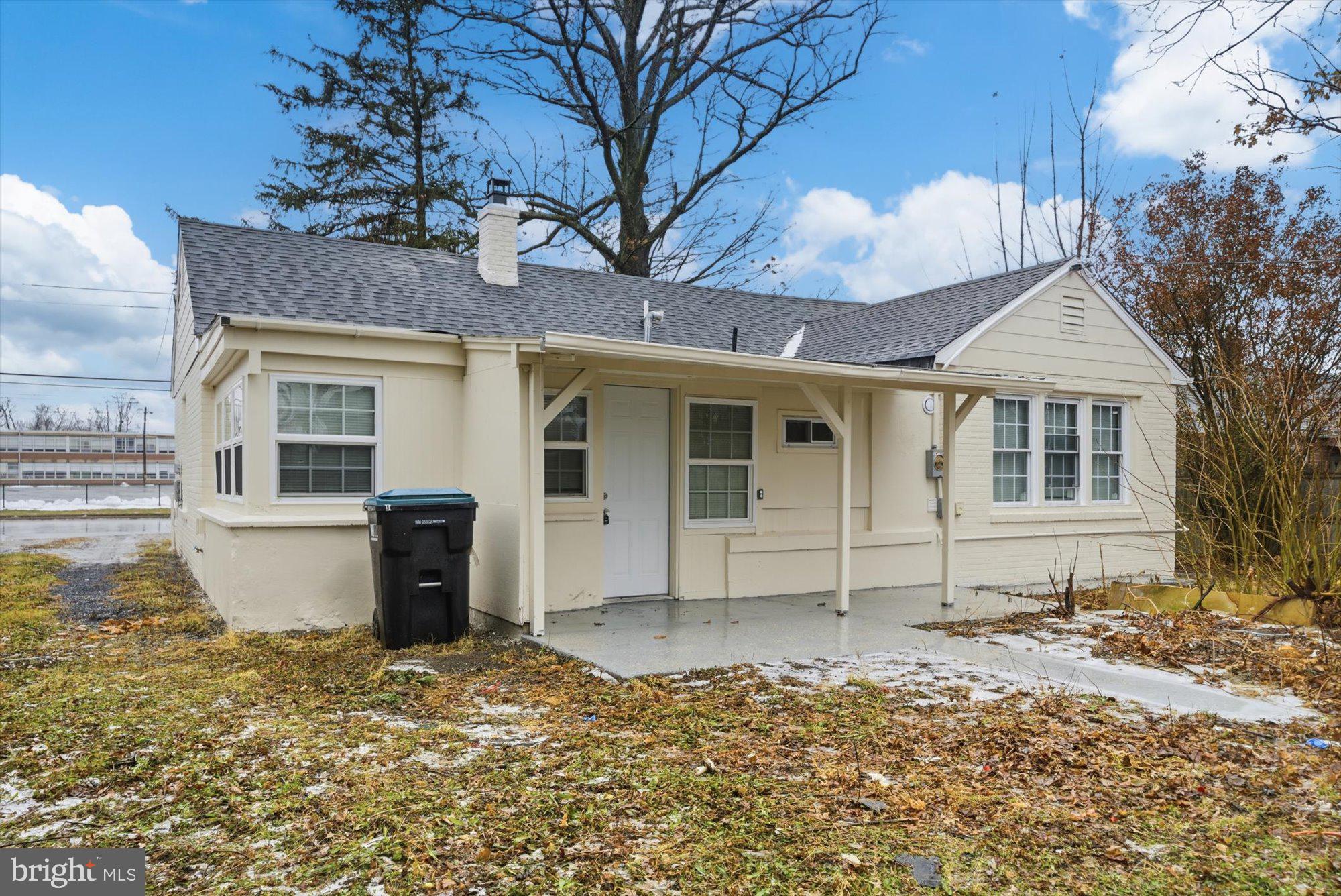 733 West County Line Road Horsham, PA 19044 - Photo 22 of 24 a front view of a house with a yard and garage