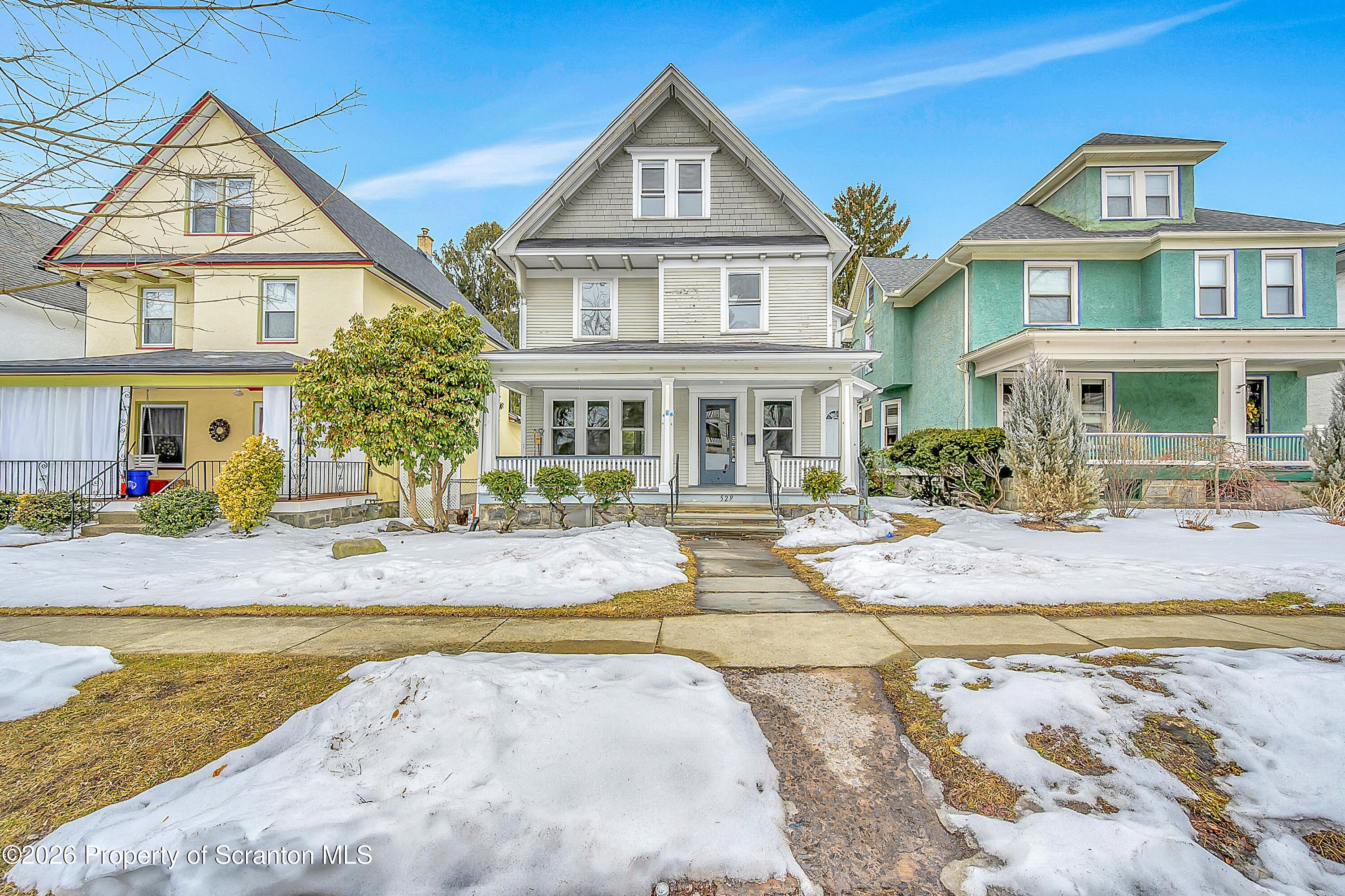 529 Wheeler Avenue, Unit 2 Scranton, PA 18510 - Photo 2 of 12 a front view of a house with swimming pool