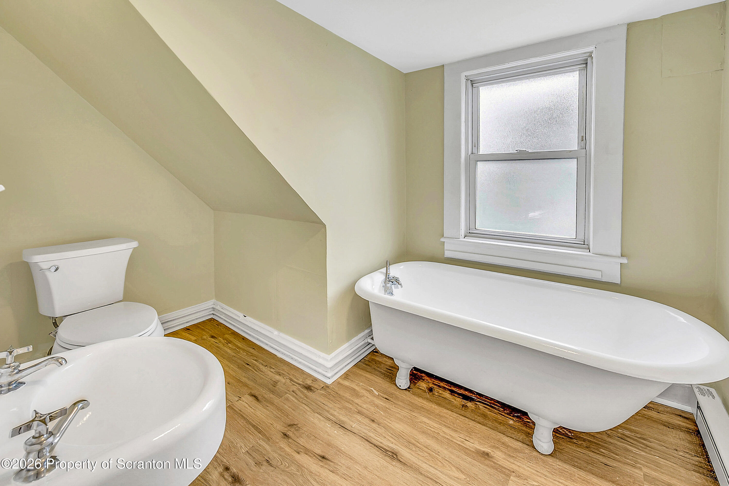 529 Wheeler Avenue, Unit 2 Scranton, PA 18510 - Photo 8 of 12 a bathroom with a sink and a toilet