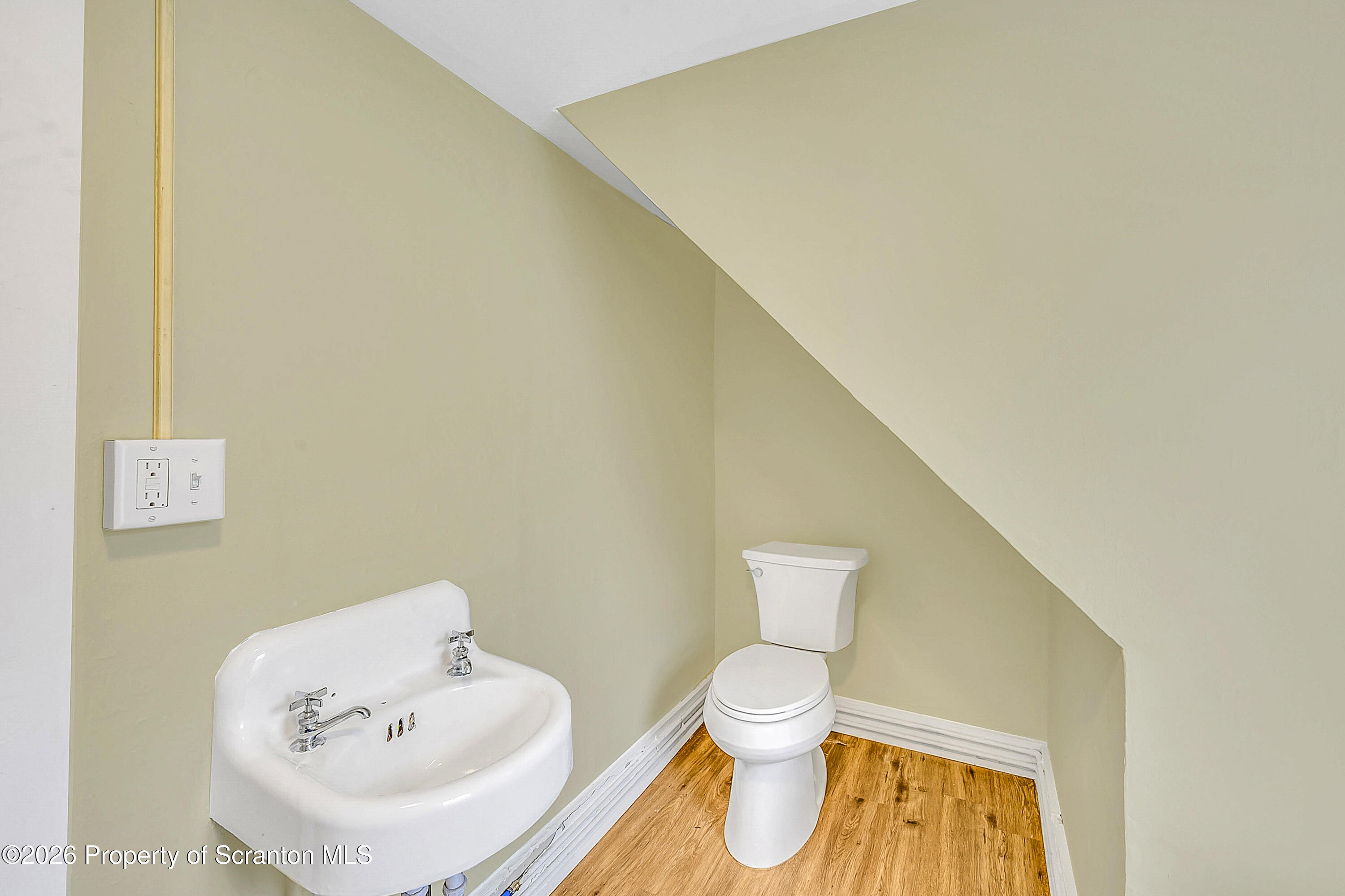 529 Wheeler Avenue, Unit 2 Scranton, PA 18510 - Photo 9 of 12 a bathroom with a sink and a toilet