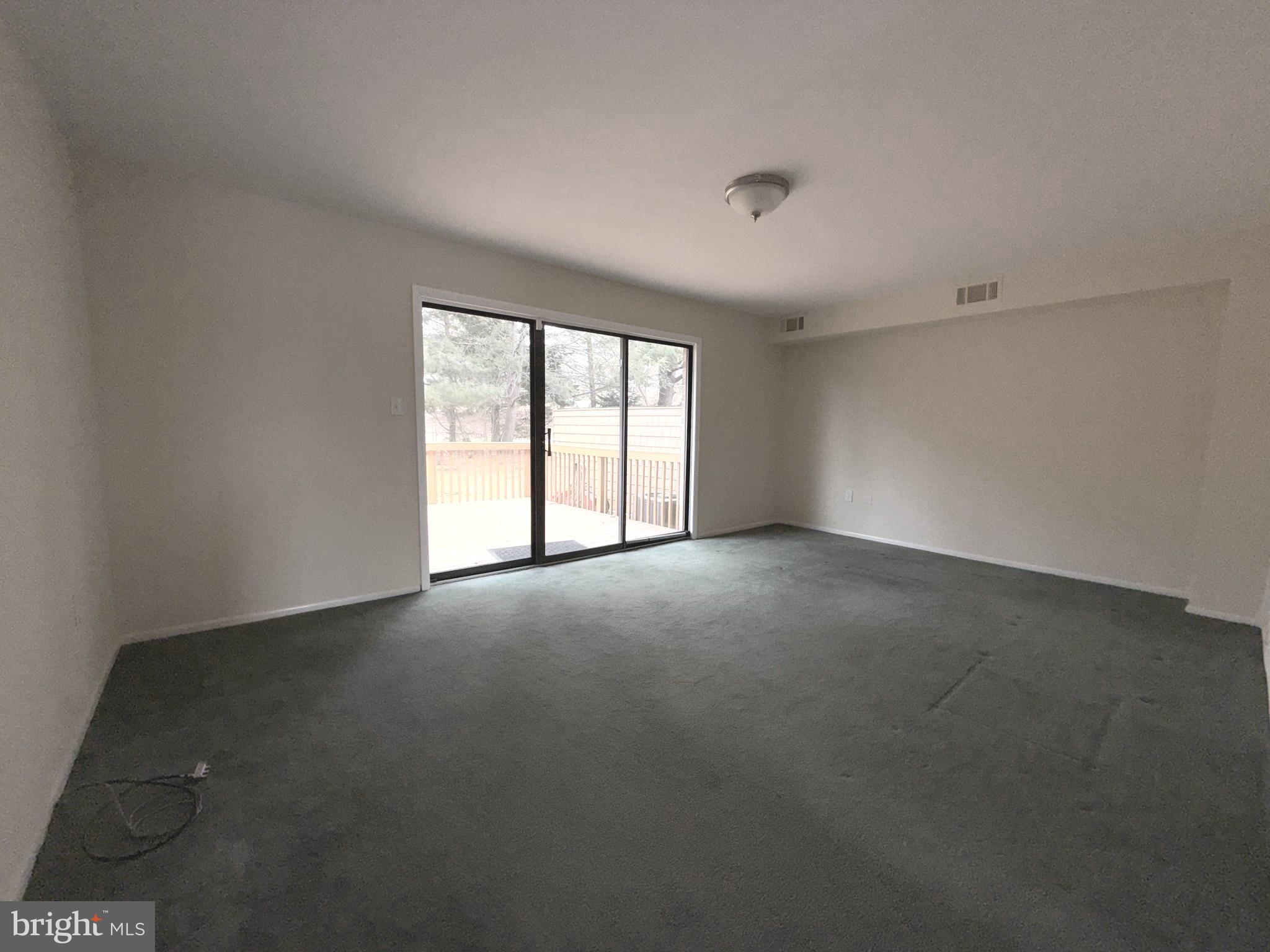 261 Bishop Drive Aston, PA 19014 - Photo 13 of 36 an empty room with windows